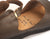 Olive T-strap handmade leather shoes by Aurora Shoe Co. - insole view on white background.